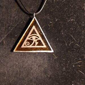 Stained glass eye of Horus pendant